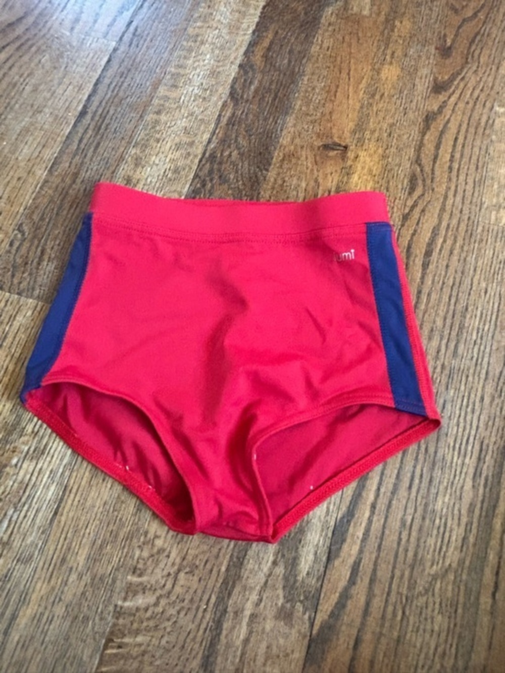 Red Kids Swim Shorts with Navy Side Panels -